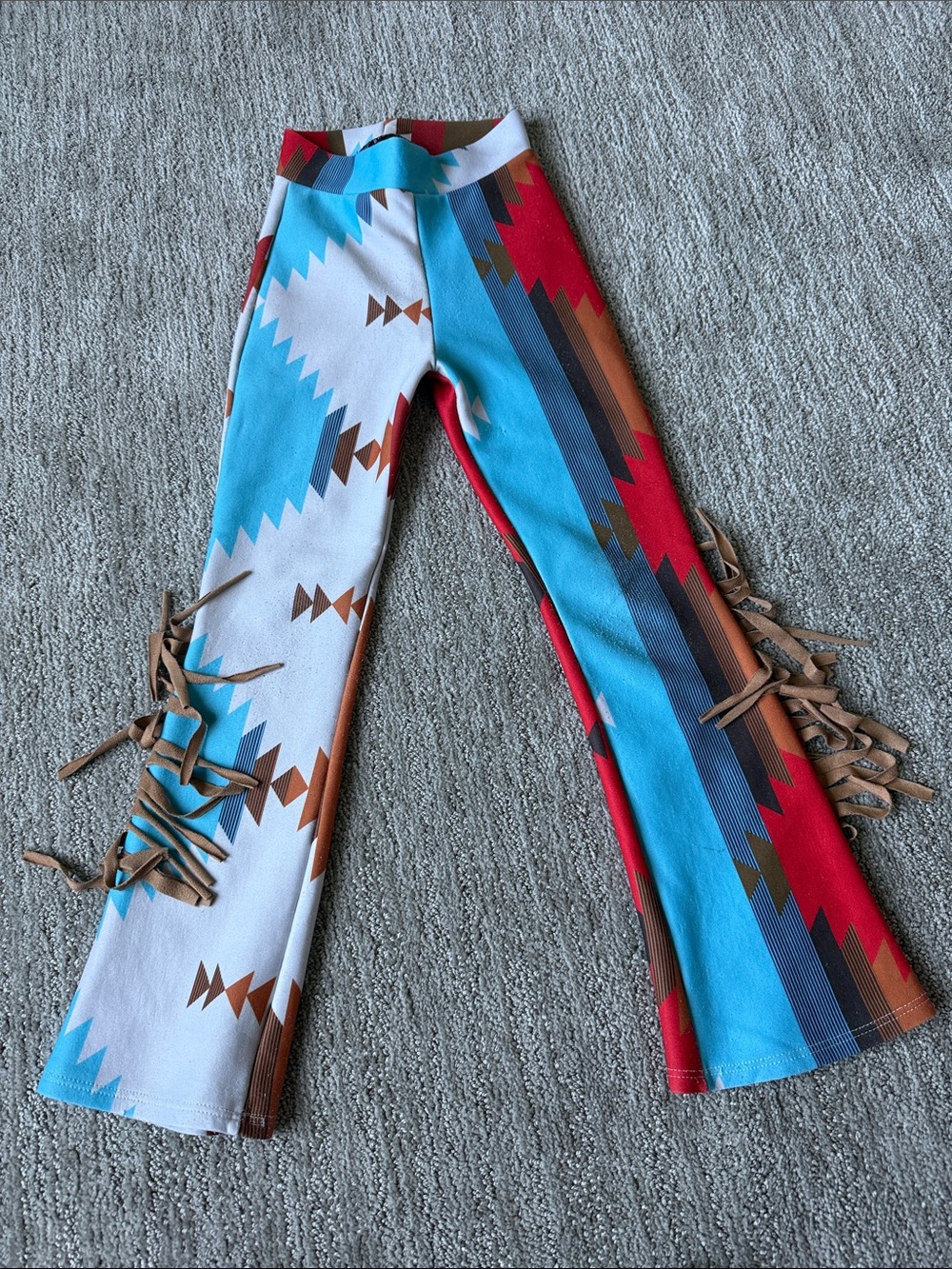 Girls S Aztec pants with fringe